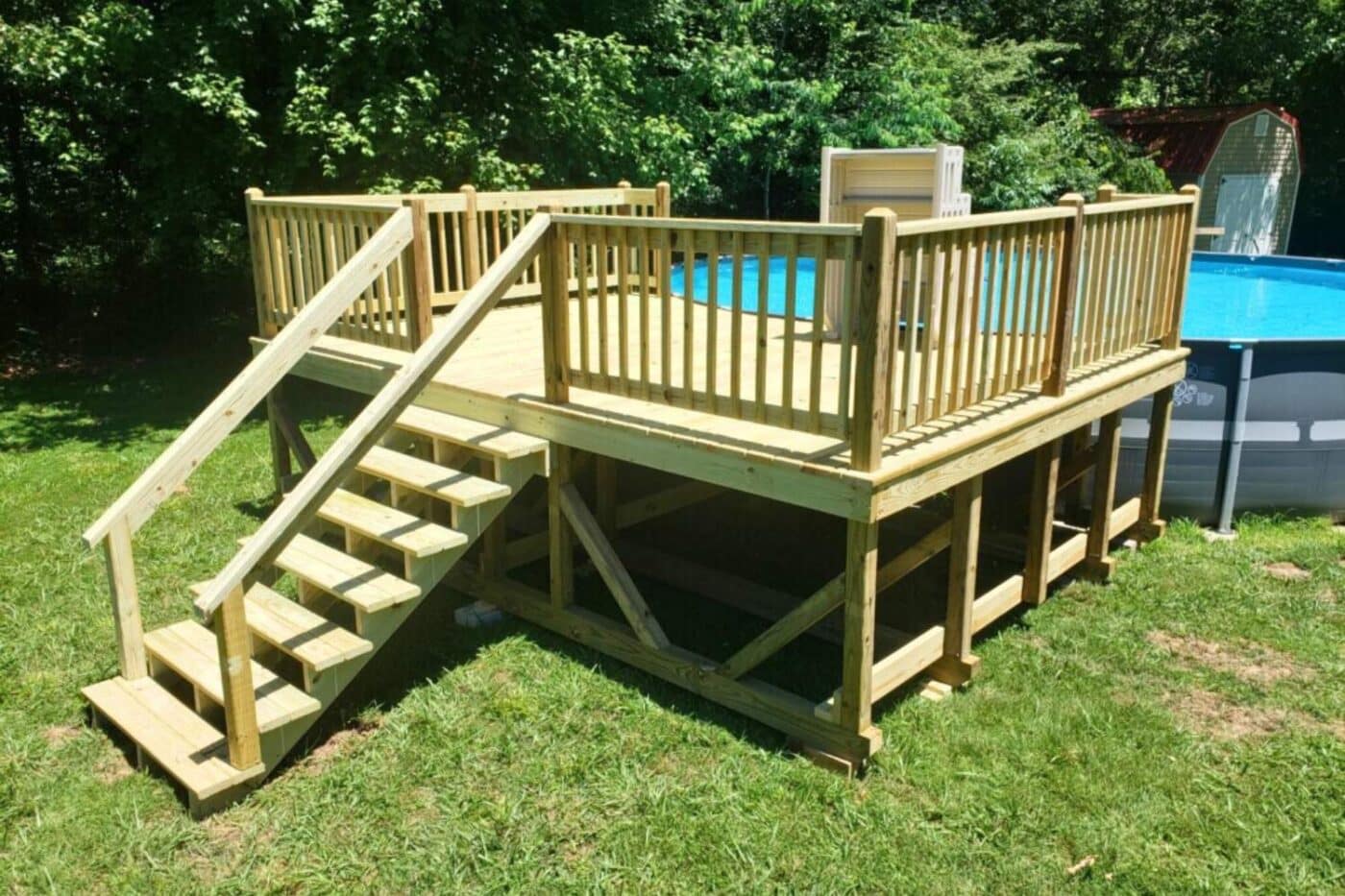 Pool deck besides above ground pool in Kentucky