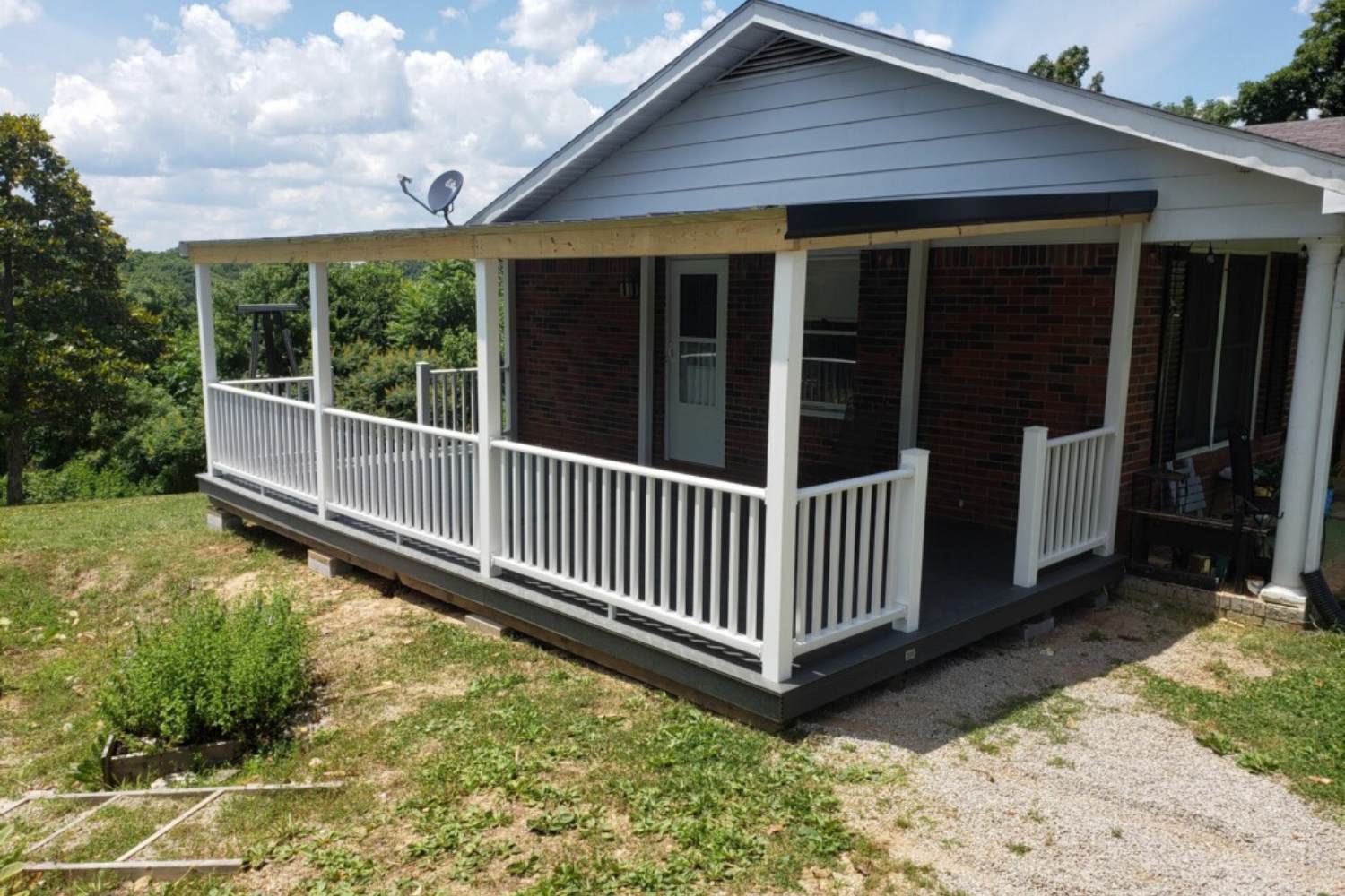 Prebuilt Porches in Kentucky 6 Porch permit in Kentucky with vinyl porch and wood overhang attached to home