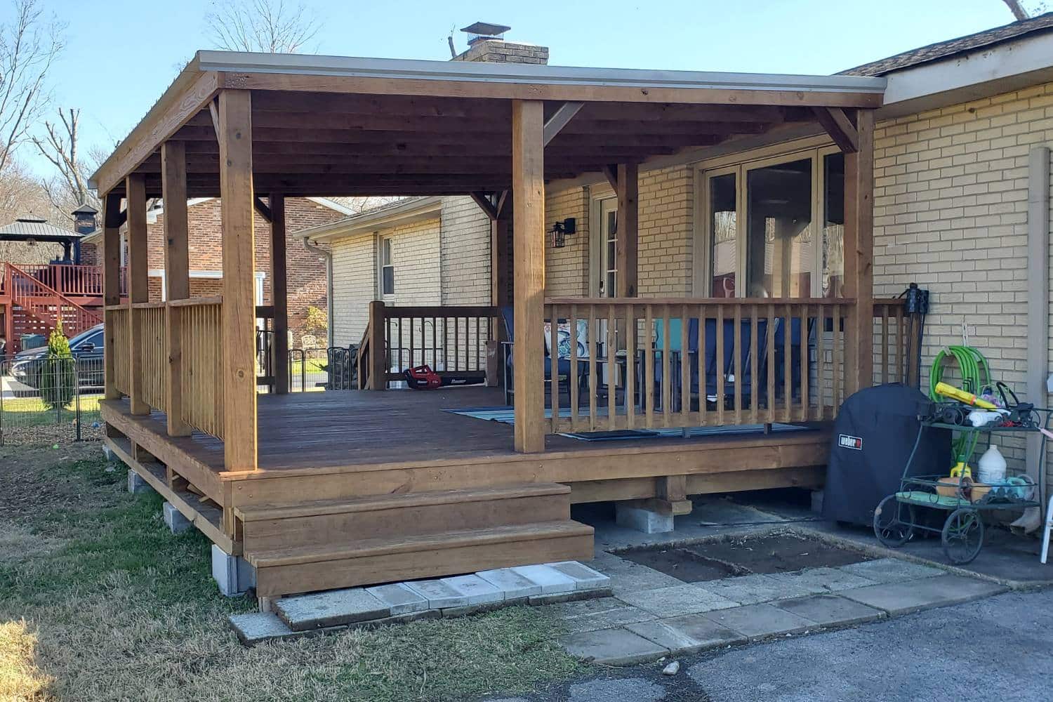 Deck attached to home in Tennessee with view of foundation and concrete footings