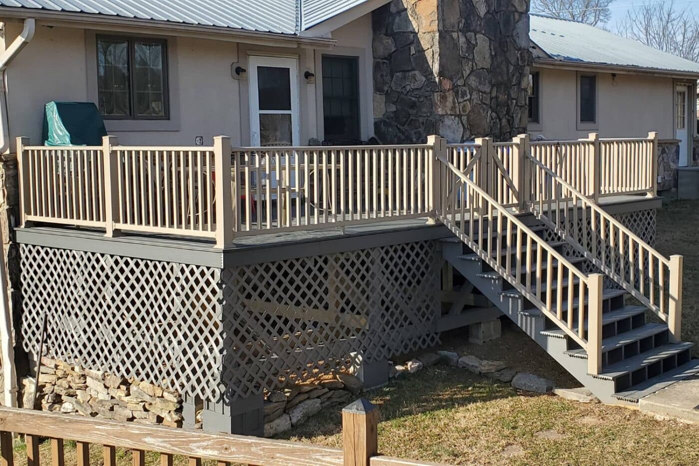 Porch with tall stps, gate, railing, and undersiding