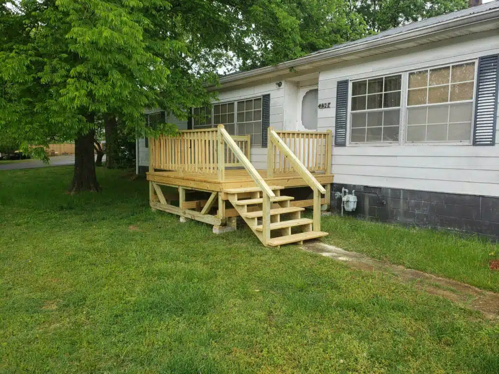 mobile home light colored wood front porch