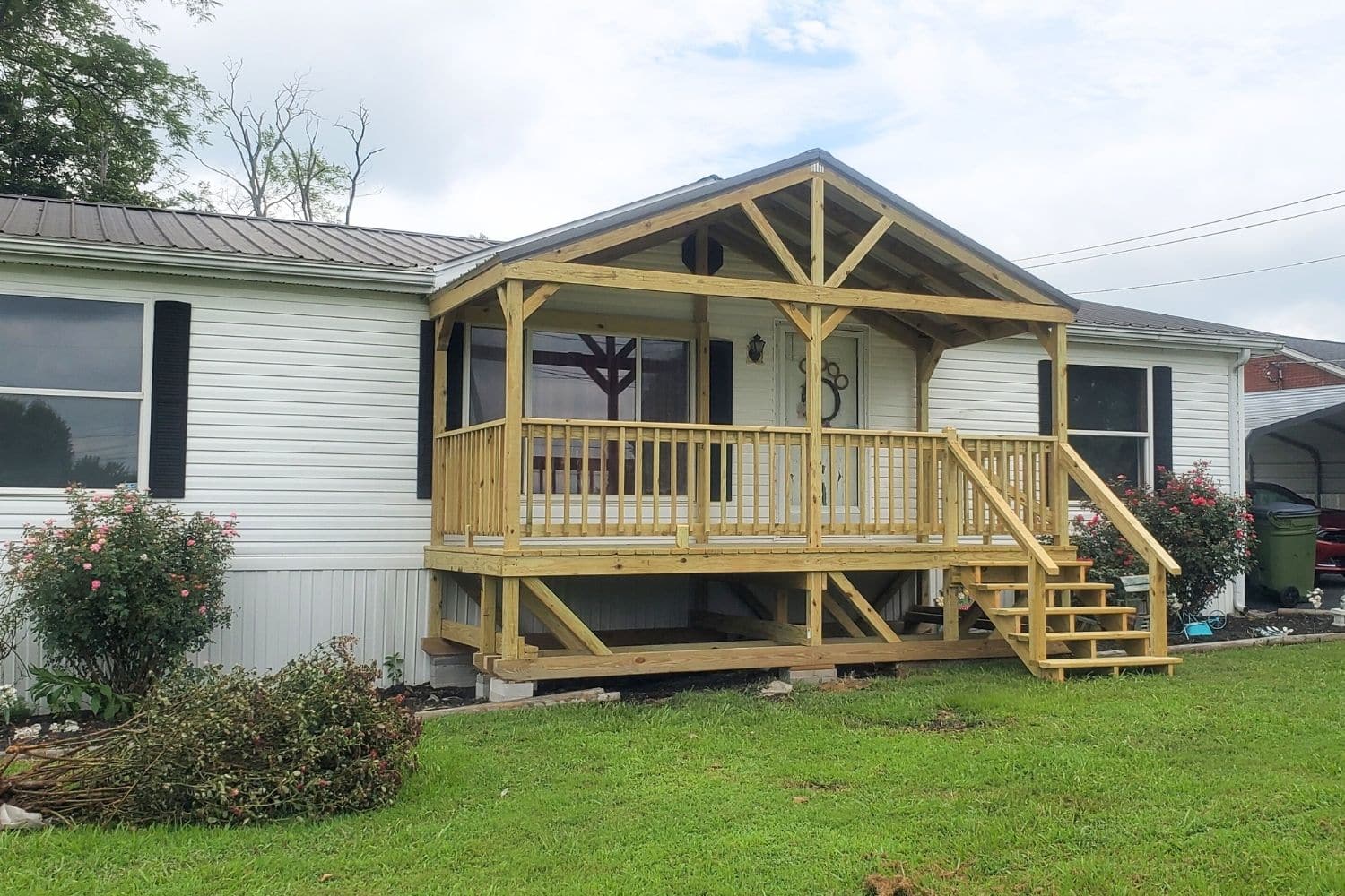 wooden a-frame deck with metal roof